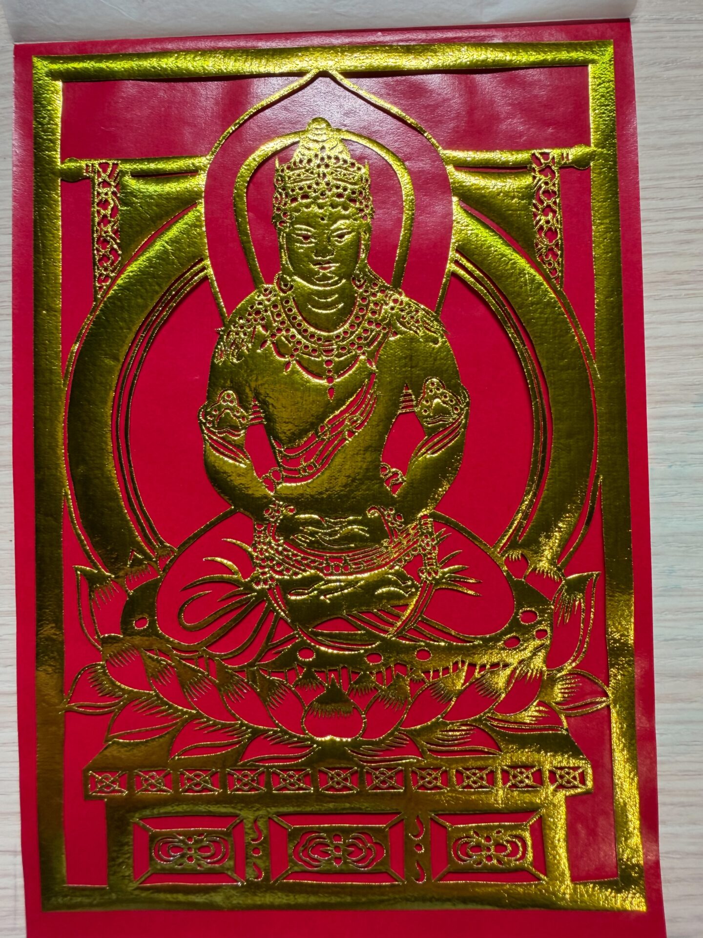 赤地の金箔装飾画